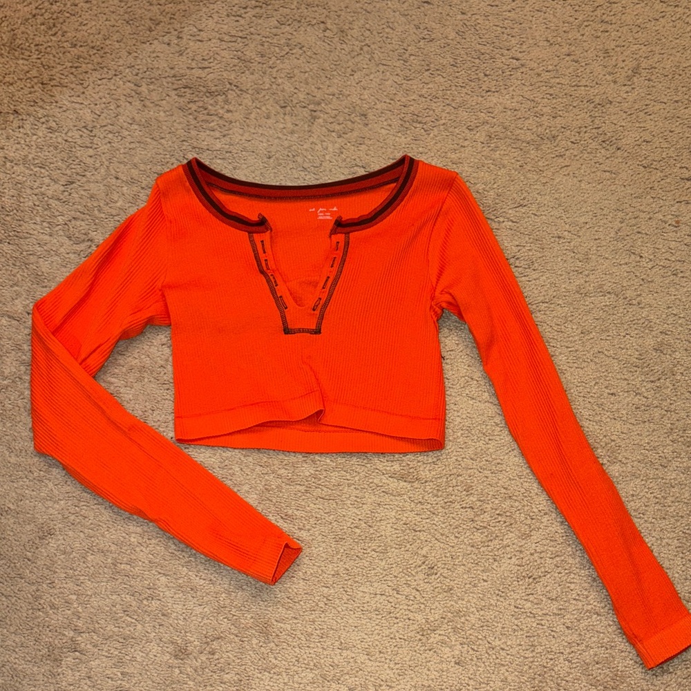 Out from under Vibrant Orange Crop Top